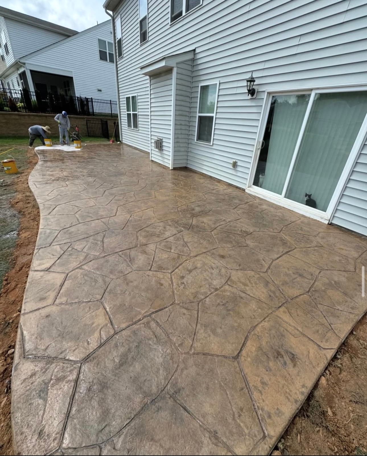 Large stamped concrete patio installation
