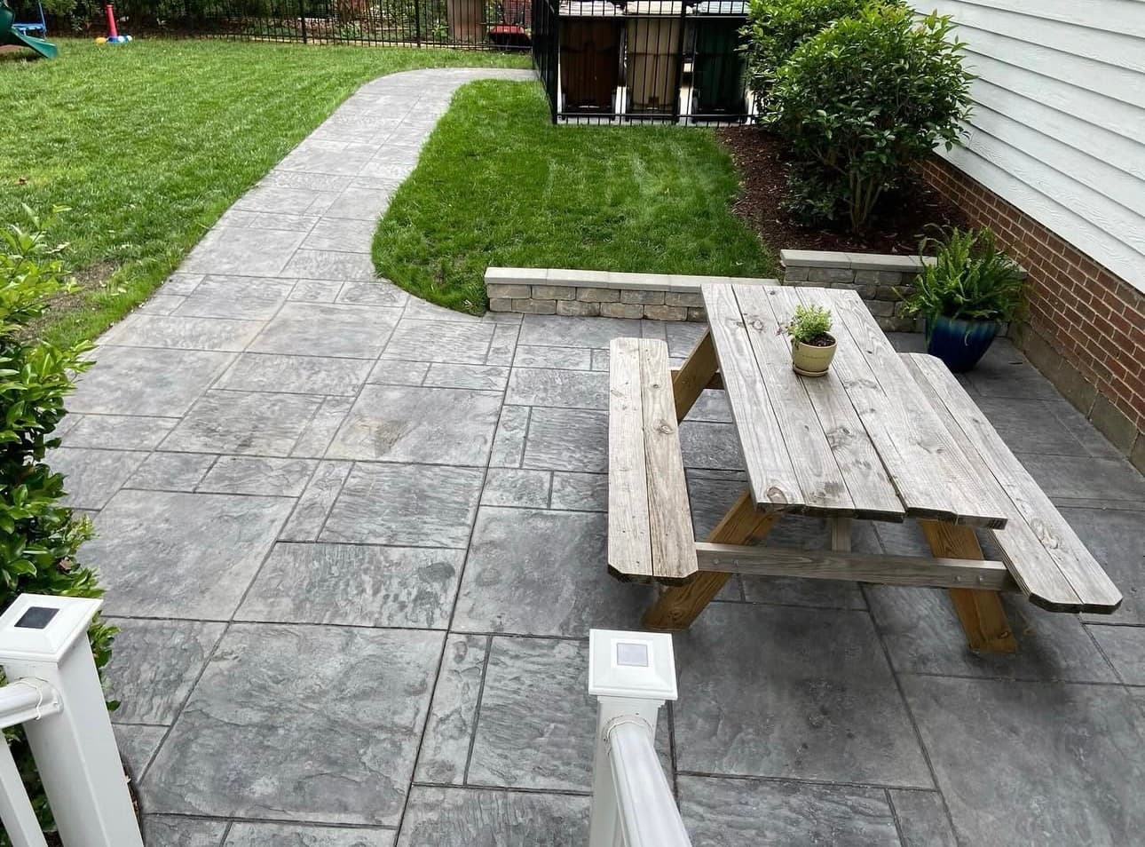 Stamped concrete patio with walkway